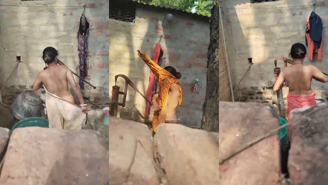 Desi Bhabhi Outdoor Bathing Secret Capture - Leaked Bangla MMS Video