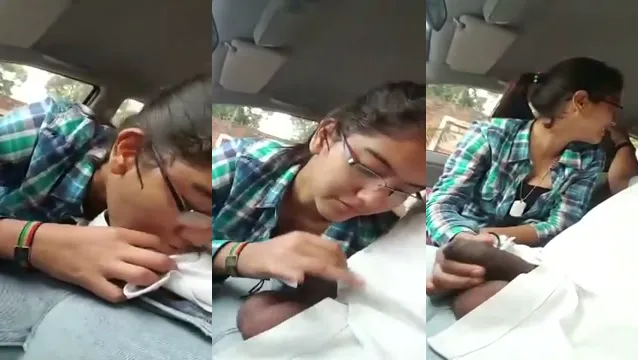 La fidanzata desi con gli occhiali succhia il cazzo del fidanzato in un MMS virale in macchina